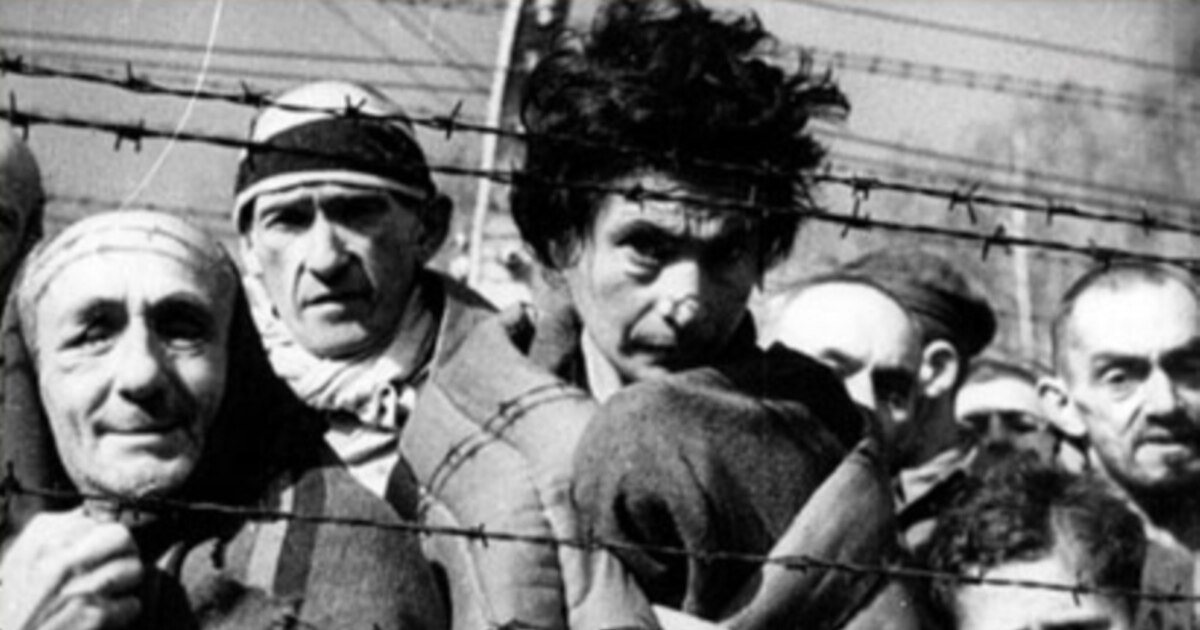 Немістер тұтқынға түскен партизандарды блять