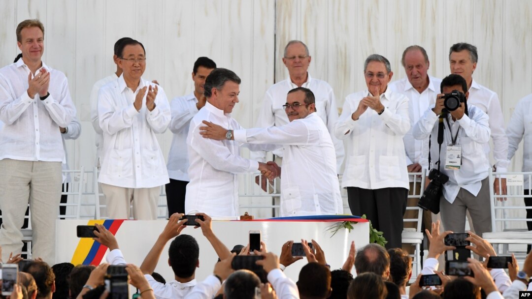 Kolumbijski predsjednik Juan Manuel Santos i vođa FARC-a Timoleon Jimenez