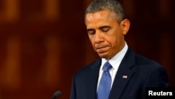 Президент США Барак Обама на панихиде по жертвам взрыва в Бостоне. 18 апреля 2013 года.