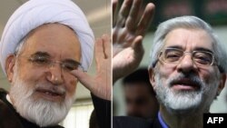 Иран оппозициясы жетекшілері Мир Хусейн Мусави (оң жақта) мен Мехди Карруби.
