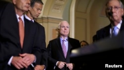 U.S. Senate Republican leaders, including John McCain (center) and Senate Majority Leader Mitch McConnell (right)