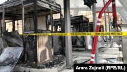A ticket office is burned in Kalimash amid protests against the highway tax imposed by the Albania government.