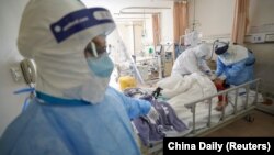 Медицинская палата в провинции Хубэй, где содержатся пациенты с подозрениями на инфекцию. 16 февраля 2020
