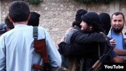 YouTube cайтында 2013 жылы жарияланған "Сирияға барған қазақстандық жихадшылар" туралы видеодан скриншот.