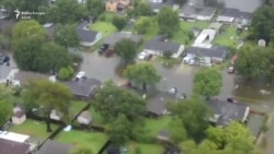 SHBA: Banorët evakuohen nga zonat e përmbytura