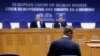 Russian opposition leader Alexei Navalny attends a hearing for the delivery of the ECHR