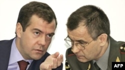Russian Interior Minister Rashid Nurgaliyev (right) with President Dmitry Medvedev