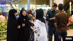 Iran enforces a dress code that requires women to cover their hair with the Islamic head scarf, or hijab, and enforces the measure through periodic crackdowns.