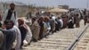 FILE: Afghan refugees wait for registration with Pakistani authorities in Quetta, Balochistan in August 2017.