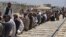 FILE: Afghan refugees wait for registration with Pakistani authorities in Quetta, Balochistan in August 2017.