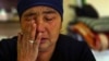 China - In this Dec. 6, 2018 photo, Nurbakyt Kaliaskar cries as she speaks about her daughter's detainment in a Chinese internment camp during an interview in Almaty, Kazakhstan. Kaliaskar, who lives in neighboring Kazakhstan, says her 25-year-old daughte