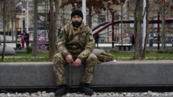 A Ukrainian soldier in Dnipro's central square on December 12