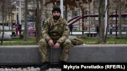A Ukrainian soldier in Dnipro's central square on December 12