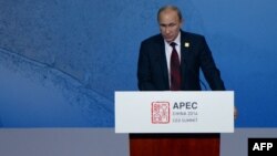 Президент России Владимир Путин на саммите АТЭС. Пекин, 10 ноября 2014 года.