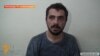 Armenia - A screenshot of a July 31 police video of the interrogation of Gevorg Melkonian, one of the gunmen that seized a police station in Yerevan.