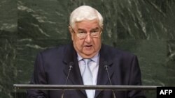 Сурия ташқи ишлар вазири Валид ал-Муаллим.
