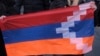 ARMENIA - Opposition demonstrators carrying Armenian national and the separatist region of Nagorno-Karabakh’s flag, right, march to the government buildings during a rally to pressure Armenian Prime Minister Nikol Pashinyan to resign in Yerevan, Armenia, 