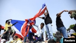 Pamje nga protestat antiqeveri në Bangkok të Tajlandës