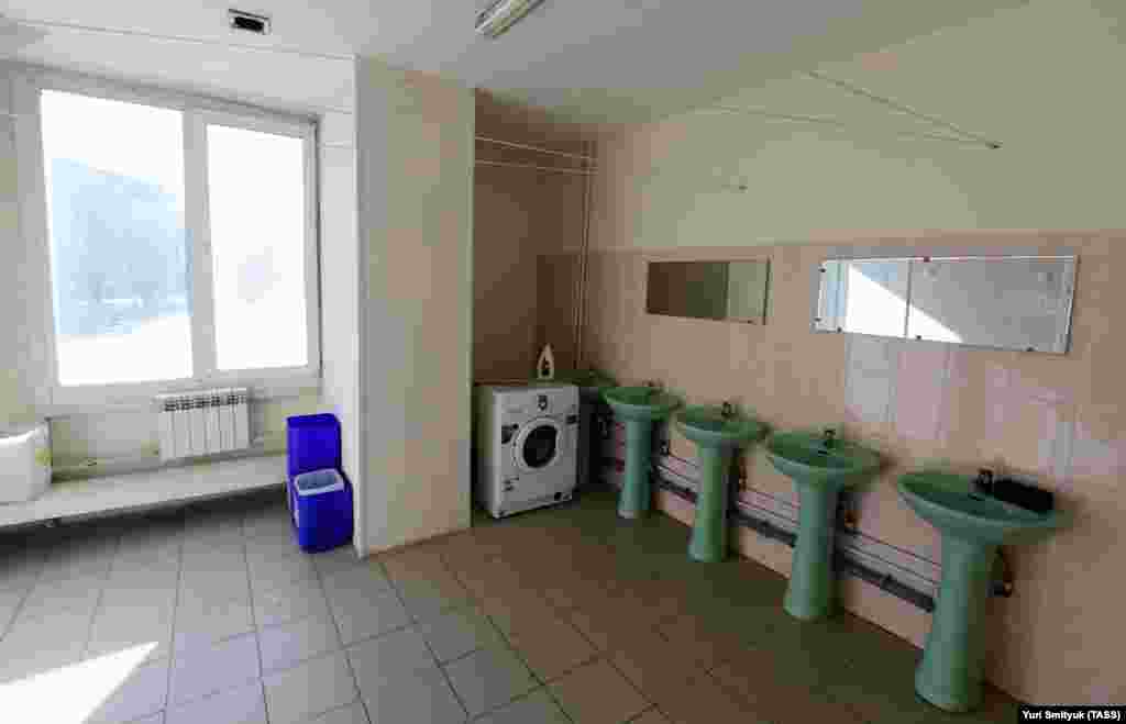 RUSSIA -- PRIMORYE TERRITORY, RUSSIA – FEBRUARY 3, 2020: A restroom in a quarantine facility for Chinese nationals at a sports and recreation centre near the Artyom crossing on the Russian-Chinese border in Russia’s Far East; Russia has opened several qua