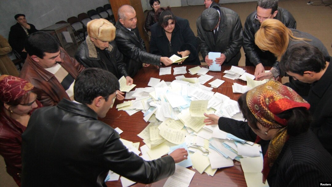 Tajik election workers counting ballots at a polling station in Dushanbe after votes were cast in a February 2010 election.