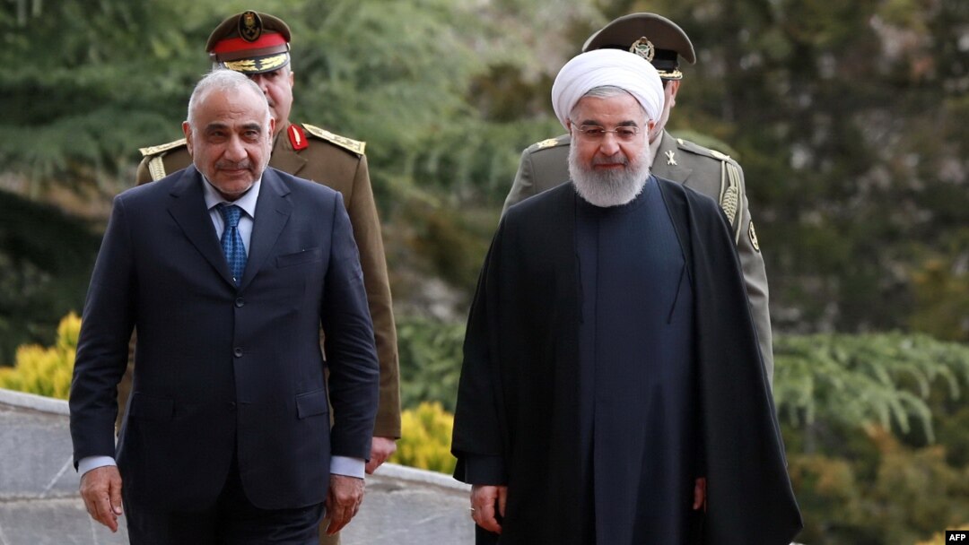 Iranian President Hassan Rouhani (right) receives Iraqi Prime Minister Adel Abdel Mahdi in Tehran on April 6.