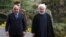 Iranian President Hassan Rouhani (right) receives Iraqi Prime Minister Adel Abdel Mahdi in Tehran on April 6. 