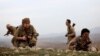 مقاتلون من عناصر الحزب الديمقراطي الكردستاني الإيراني في تدريب عسكري بمنطقة كويا، 100 كلم شمال أربيل