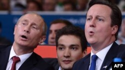 Владимир Путин и Дэвид Кэмерон на олимпийских соревнованиях по дзюдо. Лондон, 2 августа 2012 г