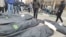 Victims of a crackdown on protesters in Iran lie in body bags as they are processed at the Kahrizak Forensic Medical Center in Tehran.