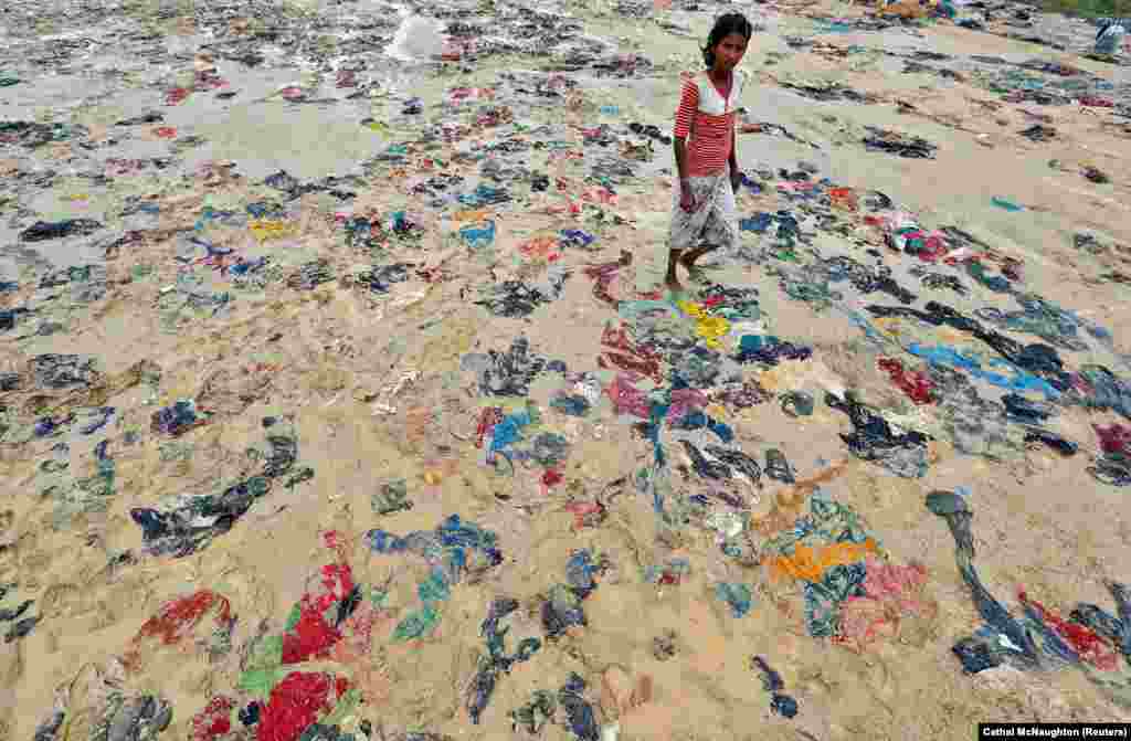 Discarded items of clothing lie strewn on the ground in a Rohingya refugee camp in Cox's Bazar, Bangladesh. (Reuters/Cathal McNaughton)