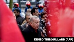 TURKEY - Turkish President Recep Tayyip Erdogan delivers a speech as he arrives for a meeting at Permanent Representation of Turkey to the European Union in Brussels on March 9, 2020