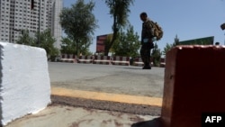 Blood stains are seen at the scene where a NATO soldier was stabbed to death in Kabul, August 20, 2014.