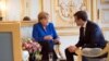 Меркель і Макрон закликали Путіна і Порошенка виконати зобов’язання про припинення вогню