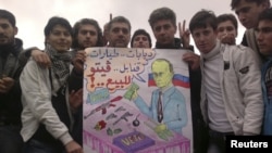 Siriýanyň Kafranbel şäherinde geçirilýän protestler mahalynda, 29-njy ýanwar.