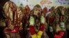 Brides sit together during a mass wedding ceremony in Peshawar. (file photo)