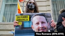 Amnesty International protesters demonstrate against the death penalty for Ahmadreza Djalali in front of the Piedmont Regional Council in Turin, Italy, in Decembember 2020.