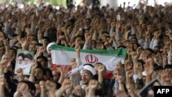 Iran -- Worshippers cheer and greet supreme leader Ayatollah Ali Khamenei at the weekly Muslim Friday prayers at Tehran University, 19Jun2009