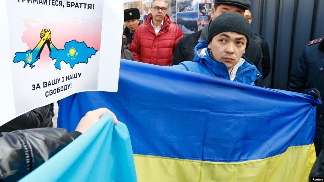 Kazakhs protest outside the Consulate-General of Russia in Almaty on March 3, supporting Ukraine "for your and our freedom." 