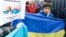 Kazakhs protest outside the Consulate-General of Russia in Almaty on March 3, supporting Ukraine "for your and our freedom." 