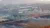 This picture taken on September 1, 2019 from a location in southern Lebanon near border with Israel, shows smoke rising from fires along the border with Israel on the Lebanese side following an exchange of fire.