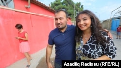 Azerbaijani journalist Seymur Hazi (left) after his release from Prison on August 29. 