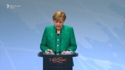 Angela Merkel și Vladimir Putin după summitul G20