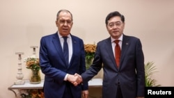 Министры иностранных дел России и Китая Сергей Лавров и Цинь Ган