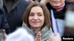 Moldovan President Maia Sandu attends a rally and concert on December 17, celebrating the European Union's decision to open membership talks with Chisinau.