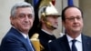 France -- Armenian President Serzh Sarkisian (L) is greeted by French President Francois Hollande upon his arrival at the Elysee Palace in Paris, March 8, 2017