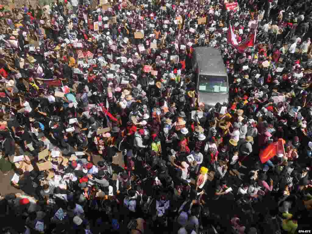 Demonstrators take part in a mass protest against the military coup in Yangon, Myanmar, 08 February 2021.