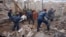 Рятувальники розбирають завали на місці російського удару в Києві, 6 липня 2026 року