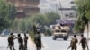 AFGHANISTAN -- Afghan National Army (ANA) soldiers arrive at the site of gunfire and attack in Jalalabad city, Afghanistan July 11, 2018.