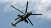 Armenia - An Armenian Mi-24 combat helicopter flies near Yerevan, 11Jun2014.