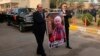 Mourners transport the flag-draped coffin of Iraqi archaeologist Lamia al-Gailani during her funeral procession in Baghdad on January 21.